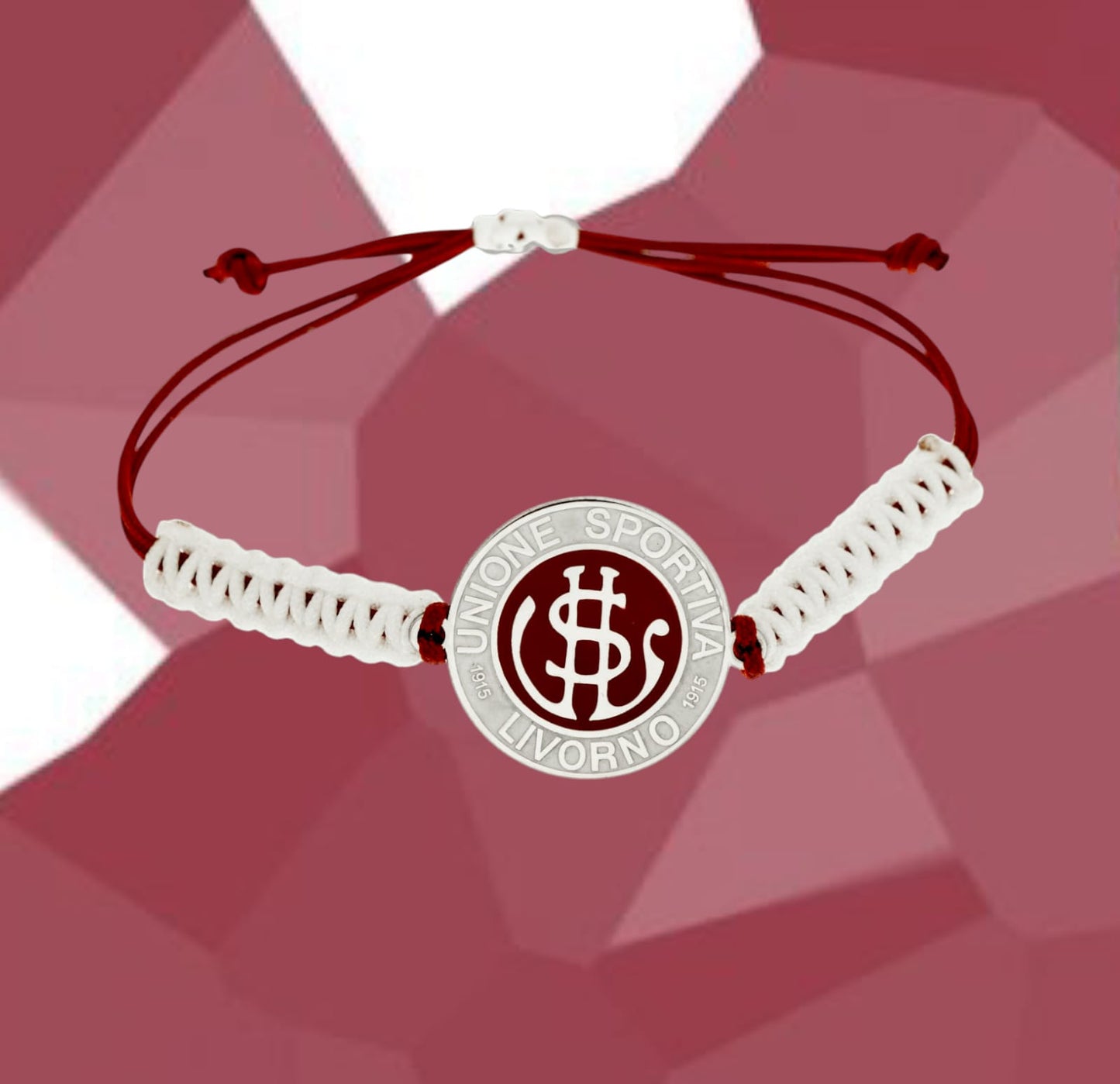 Bracciale dell'US Livorno è un gioiello esclusivo in argento 925 , realizzato con cura artigianale nel nostro laboratorio orafo a Livorno . Il design, elegante e unico, è ottenuto grazie a un'incisione laser precisa e una finitura smaltata a caldo , che aggiunge un tocco di colore e profondità. Un accessorio perfetto per chi desidera portare con sé il simbolo della propria squadra del cuore, unendo passione sportiva e artigianalità. 