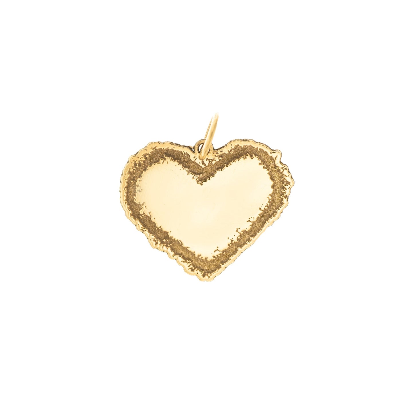 Questo ciondolo è a forma di cuore e realizzato in oro 18 carati. Ha un contorno frastagliato e irregolare, come disegnato a mano libera, con una superficie centrale liscia e morbida al tatto. La forma è piena e il bordo ha una texture ruvida, che lo rende unico e piacevole da accarezzare con le dita. È pensato per essere indossato o saldato su un gioiello, e rappresenta un sentimento puro e vero. Ogni pezzo è fatto a mano nel nostro laboratorio artigianale.
