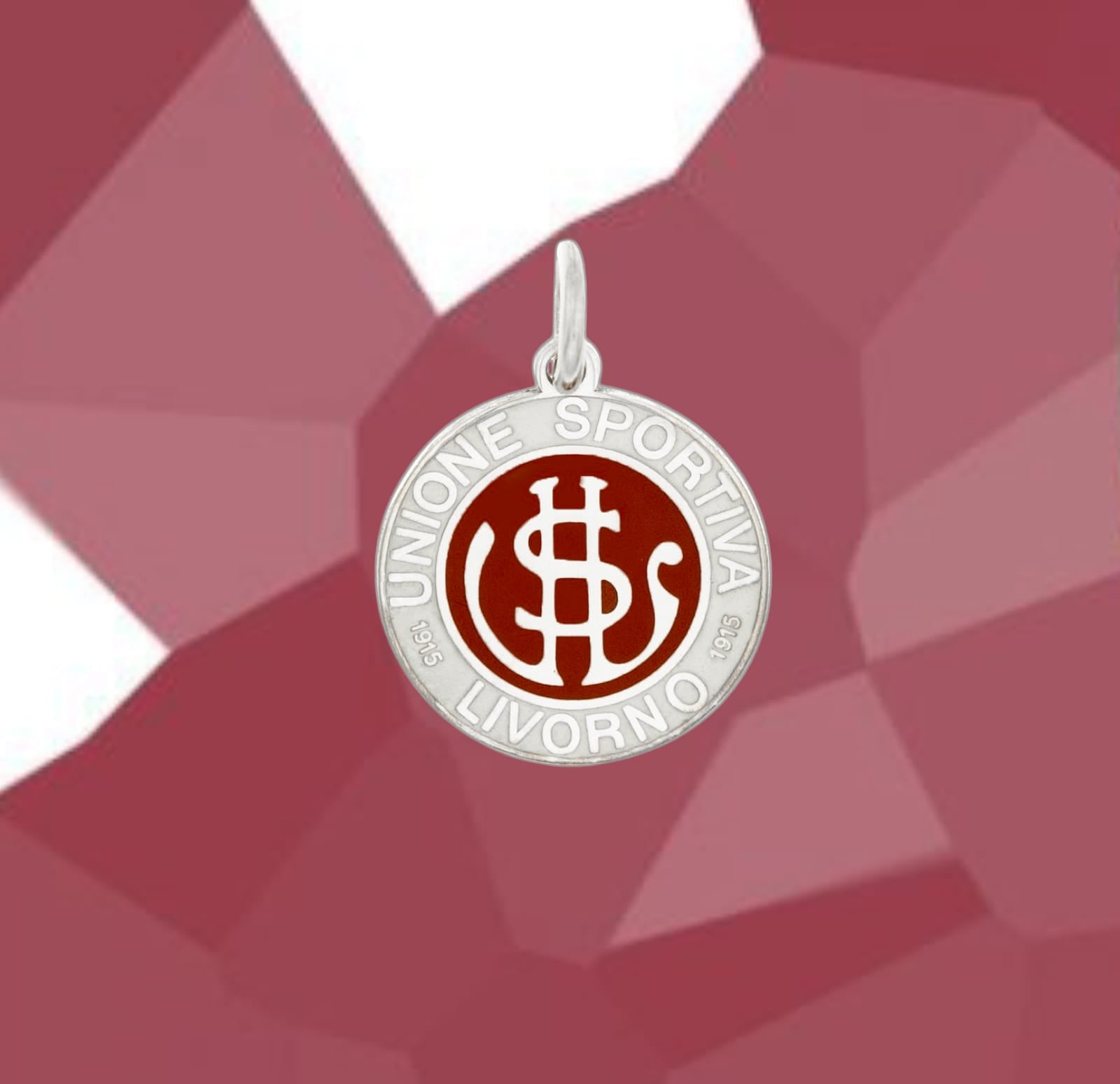 Medaglia dal diametro di 15 mm dell'U.S.Livorno è parte della nostra linea esclusiva in argento 925. Ogni dettaglio è curato con precisione grazie all'incisione laser , e la superficie smaltata a caldo aggiunge un tocco di colore e profondità, rendendo questa medaglia un simbolo distintivo e raffinato. 