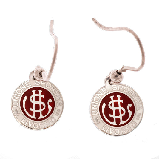 Immagina degli orecchini ad amo in argento 925, morbidi al tatto e con un tocco di eleganza. Le medagliette di 10 mm sono incise a laser e smaltate a caldo, raffigurando con cura il logo della US Livorno in un ricco colore amaranto. Realizzati con passione nel laboratorio orafo a Livorno , questi orecchini sono perfetti per chi ama i dettagli raffinati e desidera esprimere la propria passione sportiva attraverso gioielli personalizzati calcio .