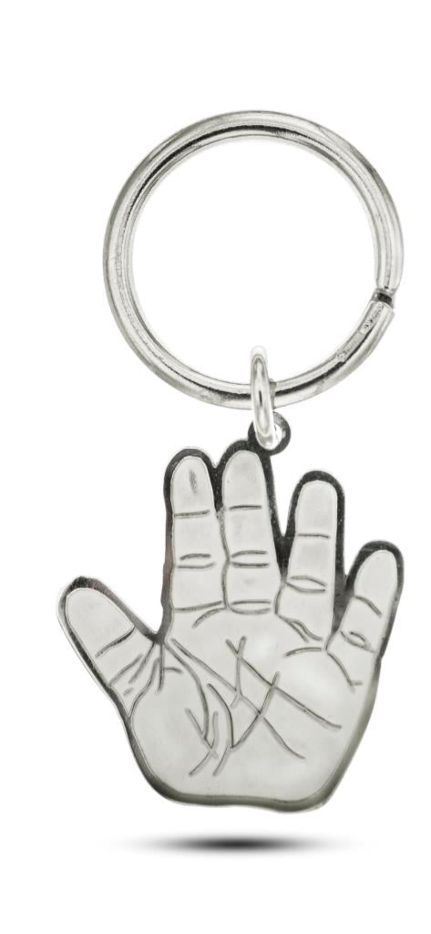 Portachiavi in argento 925, lavorato a mano, raffigurante impronte di mani e piedi del bebè. Altezza 3 cm. Un simbolo di affetto puro, ideale come regalo nascita o battesimo.