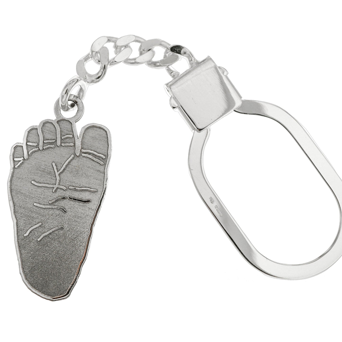 Portachiavi in argento 925, lavorato a mano, raffigurante impronte di mani e piedi del bebè. Altezza 3 cm. Un simbolo di affetto puro, ideale come regalo nascita o battesimo.