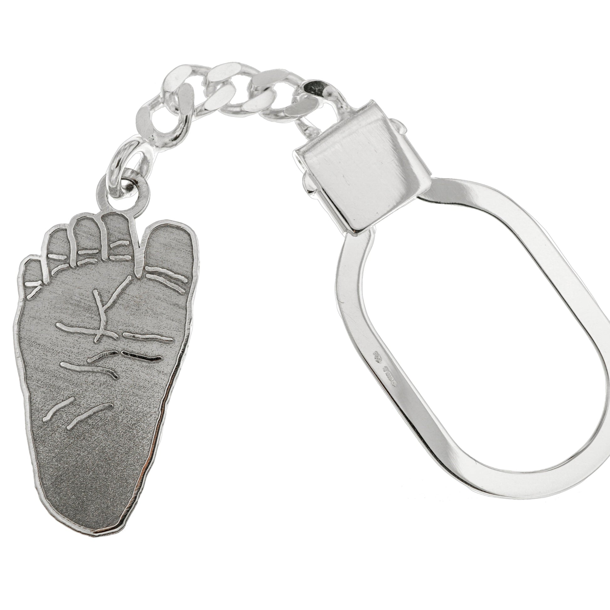 Portachiavi in argento 925, lavorato a mano, raffigurante impronte di mani e piedi del bebè. Altezza 3 cm. Un simbolo di affetto puro, ideale come regalo nascita o battesimo.